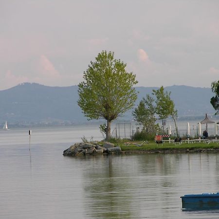 Appartamento Vacanze Magnolia E Glicine ตัวโร ซุล ตราซิเมโน ภายนอก รูปภาพ