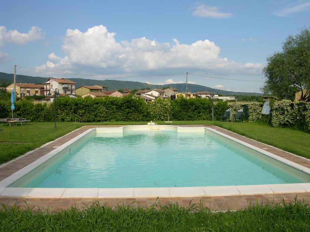 Appartamento Vacanze Magnolia E Glicine ตัวโร ซุล ตราซิเมโน ภายนอก รูปภาพ