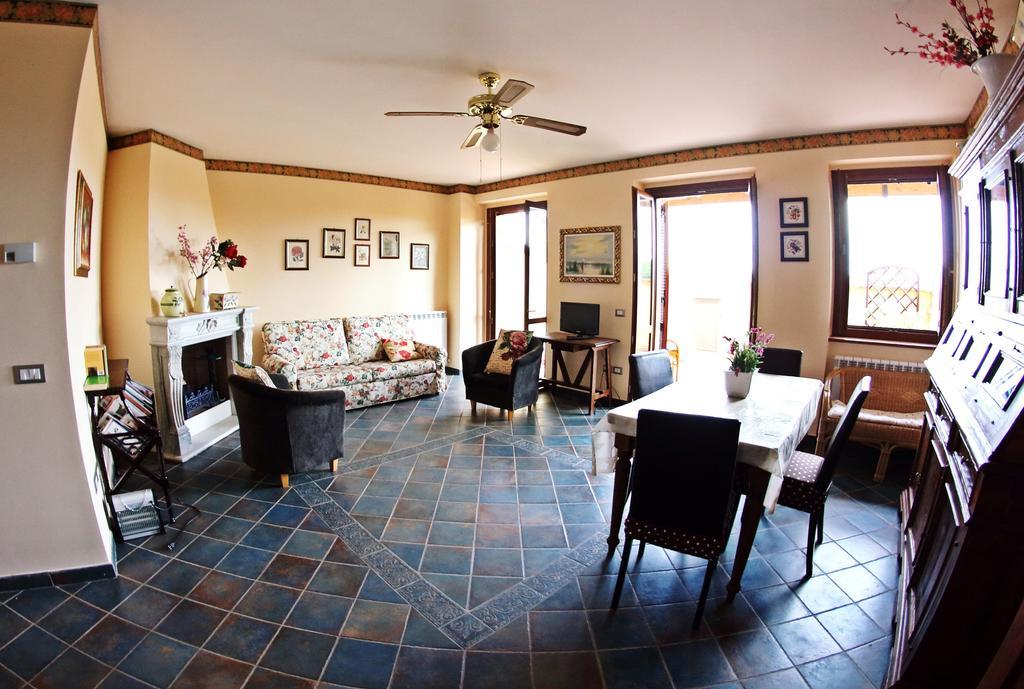 Appartamento Vacanze Magnolia E Glicine ตัวโร ซุล ตราซิเมโน ภายนอก รูปภาพ