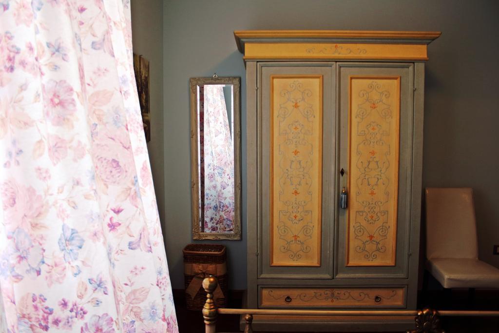 Appartamento Vacanze Magnolia E Glicine ตัวโร ซุล ตราซิเมโน ภายนอก รูปภาพ
