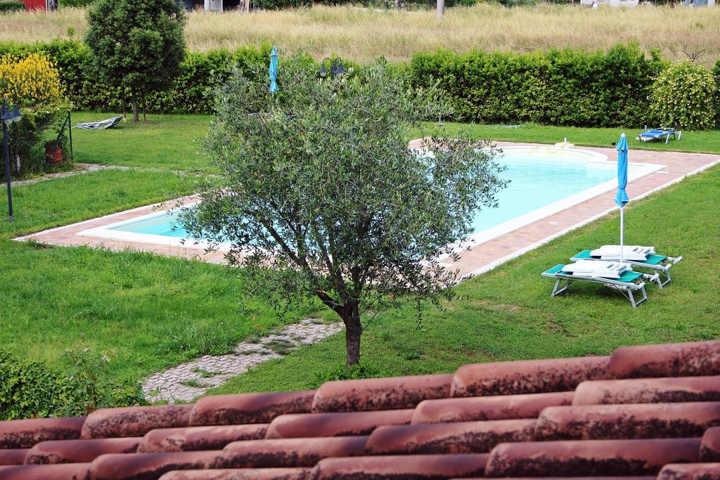 Appartamento Vacanze Magnolia E Glicine ตัวโร ซุล ตราซิเมโน ภายนอก รูปภาพ
