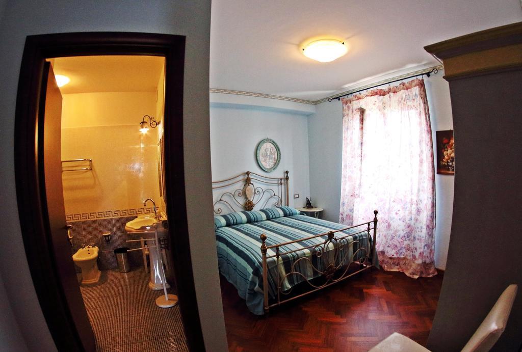 Appartamento Vacanze Magnolia E Glicine ตัวโร ซุล ตราซิเมโน ภายนอก รูปภาพ