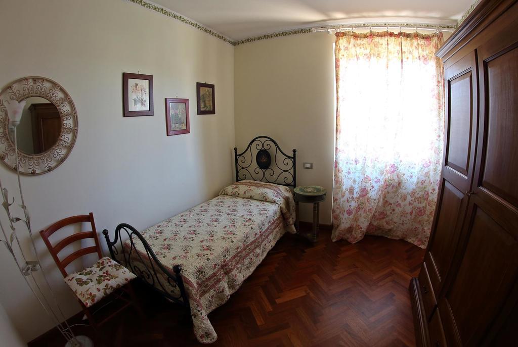 Appartamento Vacanze Magnolia E Glicine ตัวโร ซุล ตราซิเมโน ภายนอก รูปภาพ